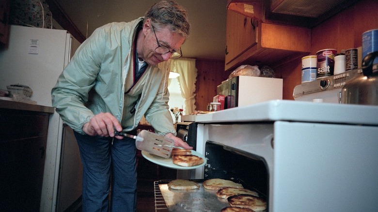 Fred Rogers making open-faced grilled cheese sandwiches