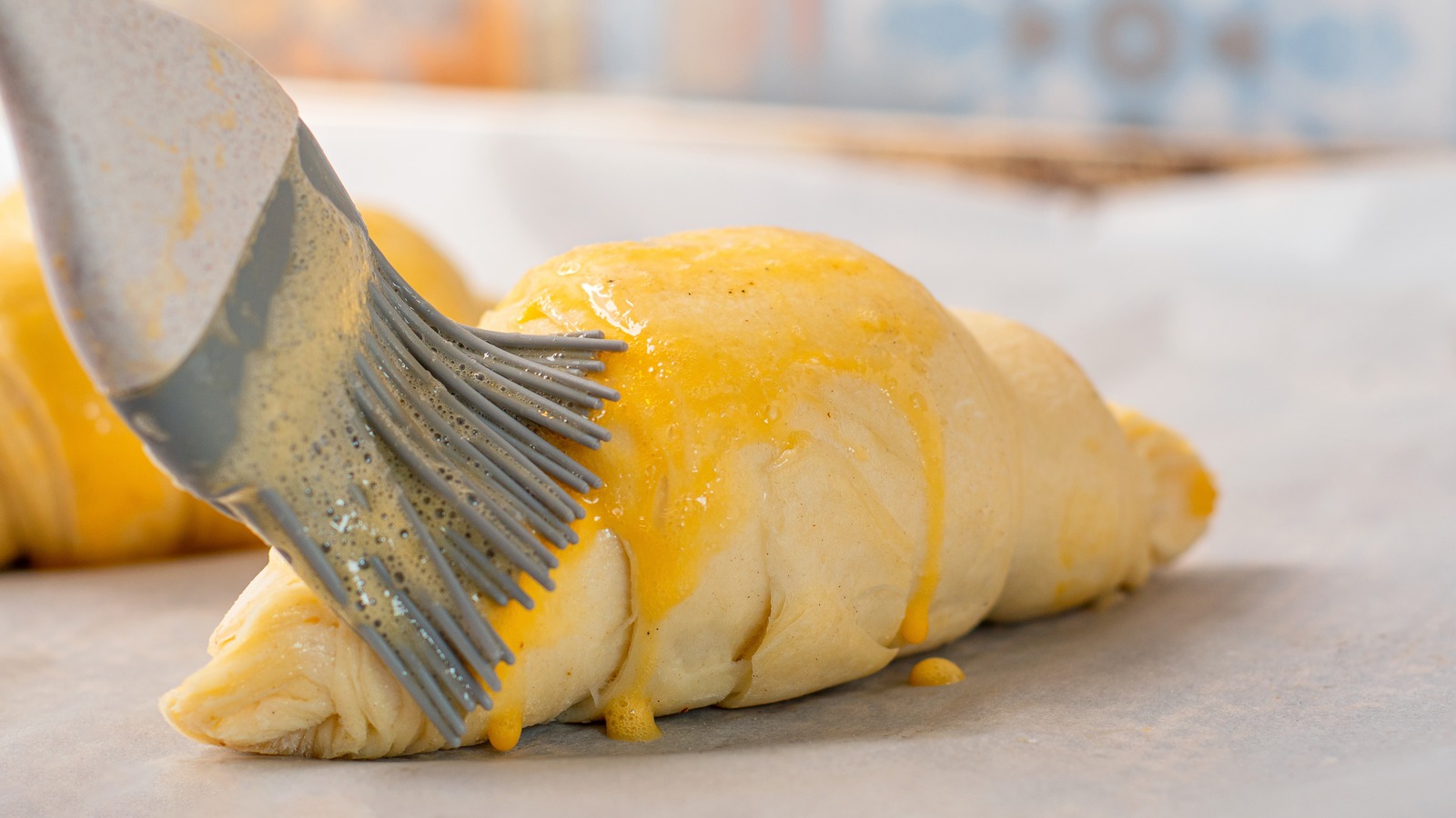 The Easy Hack To Turn Parchment Paper Into A Pastry Brush