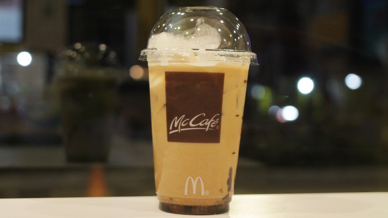 McDonald's iced coffee in a clear cup