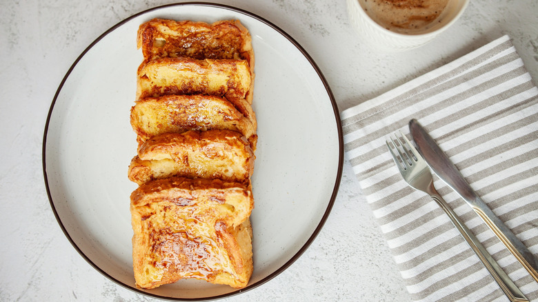 buttery toast served on plate