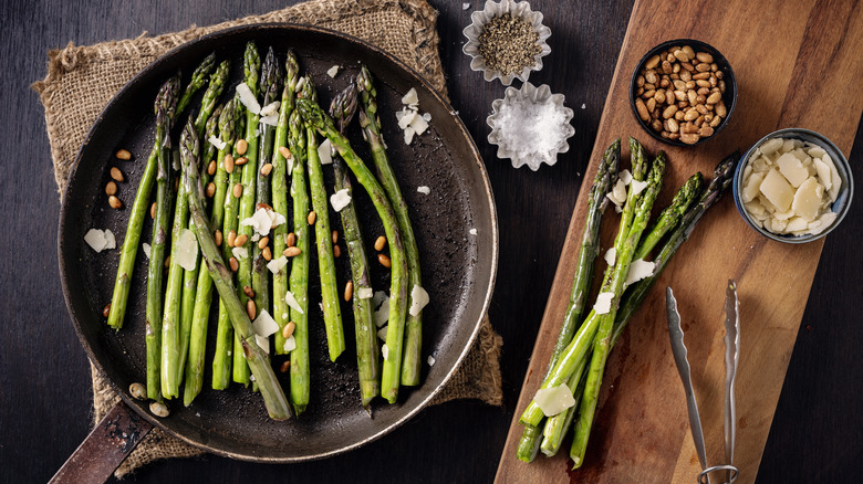 asparagus in pan with seasoning