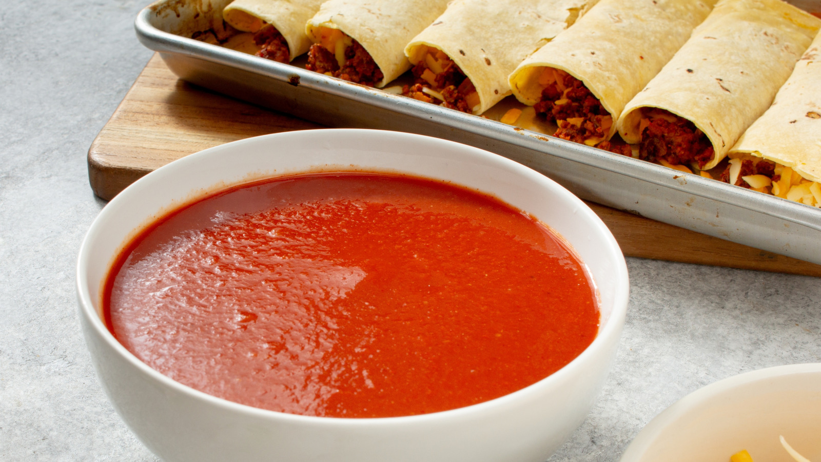 The Easy Weeknight Dish That Would Benefit From Canned Enchilada Sauce - Tasting Table