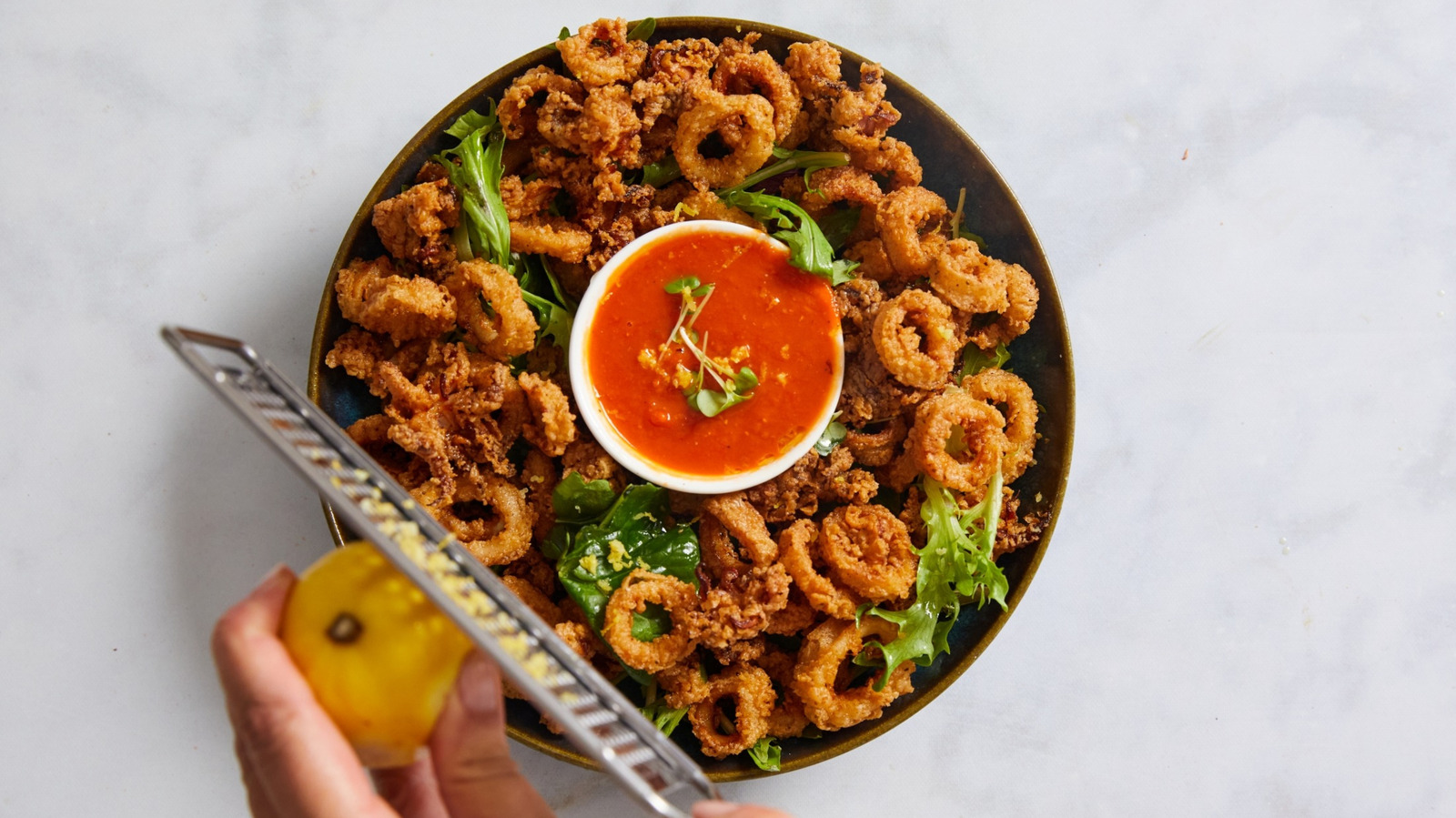 The Elusive Secret To Shatteringly Crispy Calamari - Tasting Table
