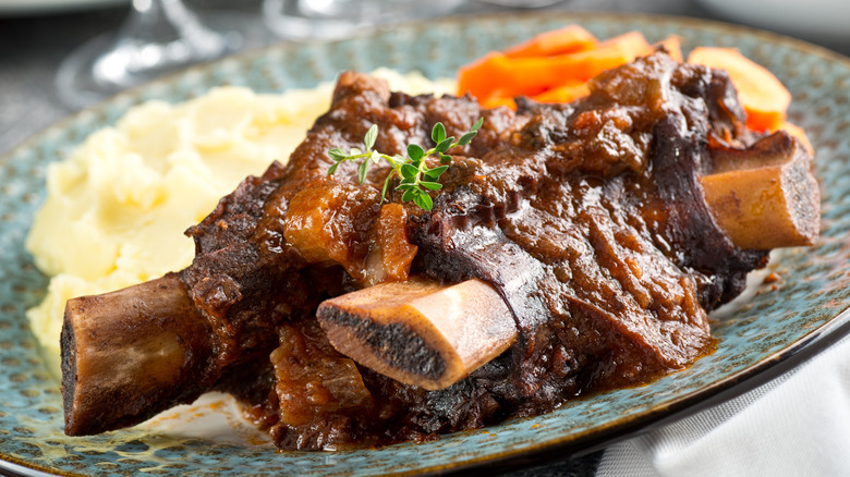 Braised short ribs with mashed potato and carrots