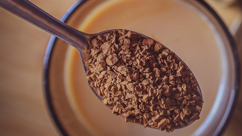 Close-up of instant coffee granules in a spoon