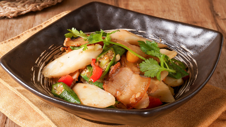 Pork belly stir-fry dish with fresh vegetables