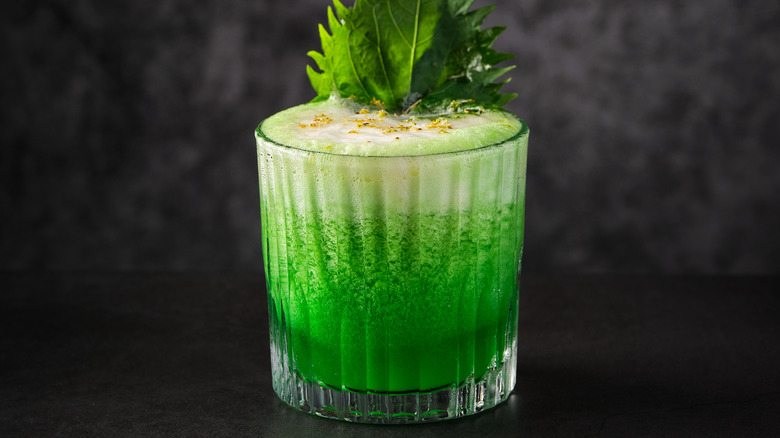 bright green cocktail in glass
