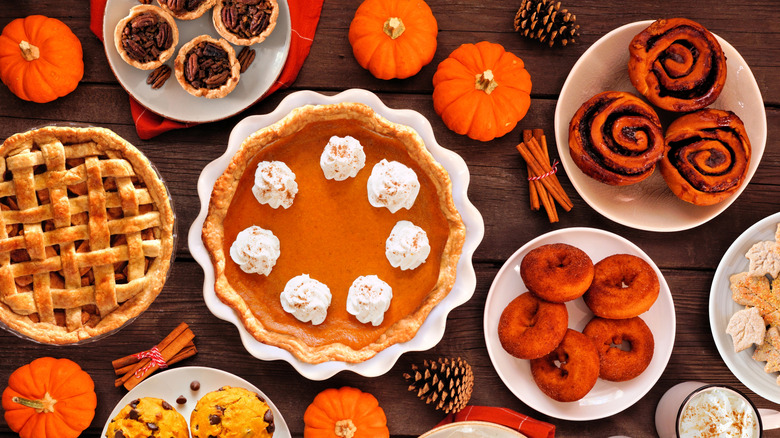 Assortment of autumnal desserts on table