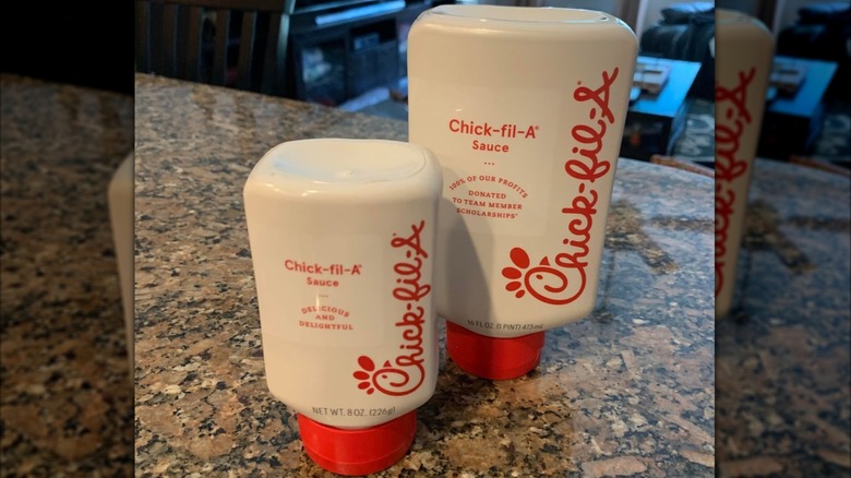 Bottles of Chick-fil-A Sauce on a kitchen countertop