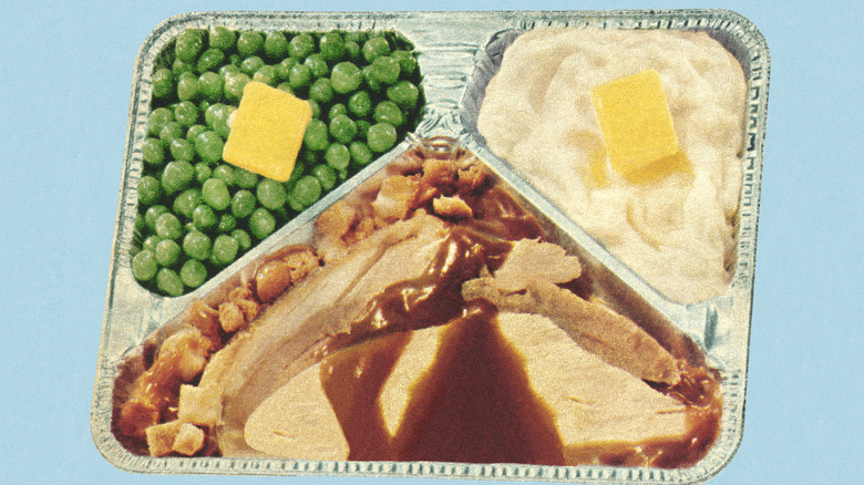 Retro turkey TV dinner in aluminum tray.