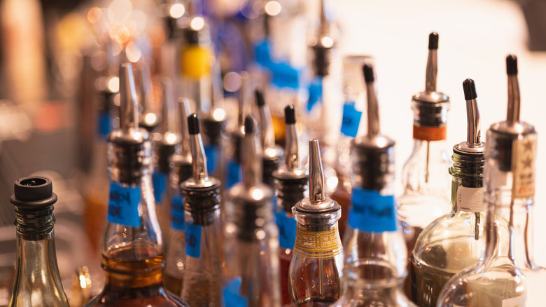 Tops of whiskies behind the bar