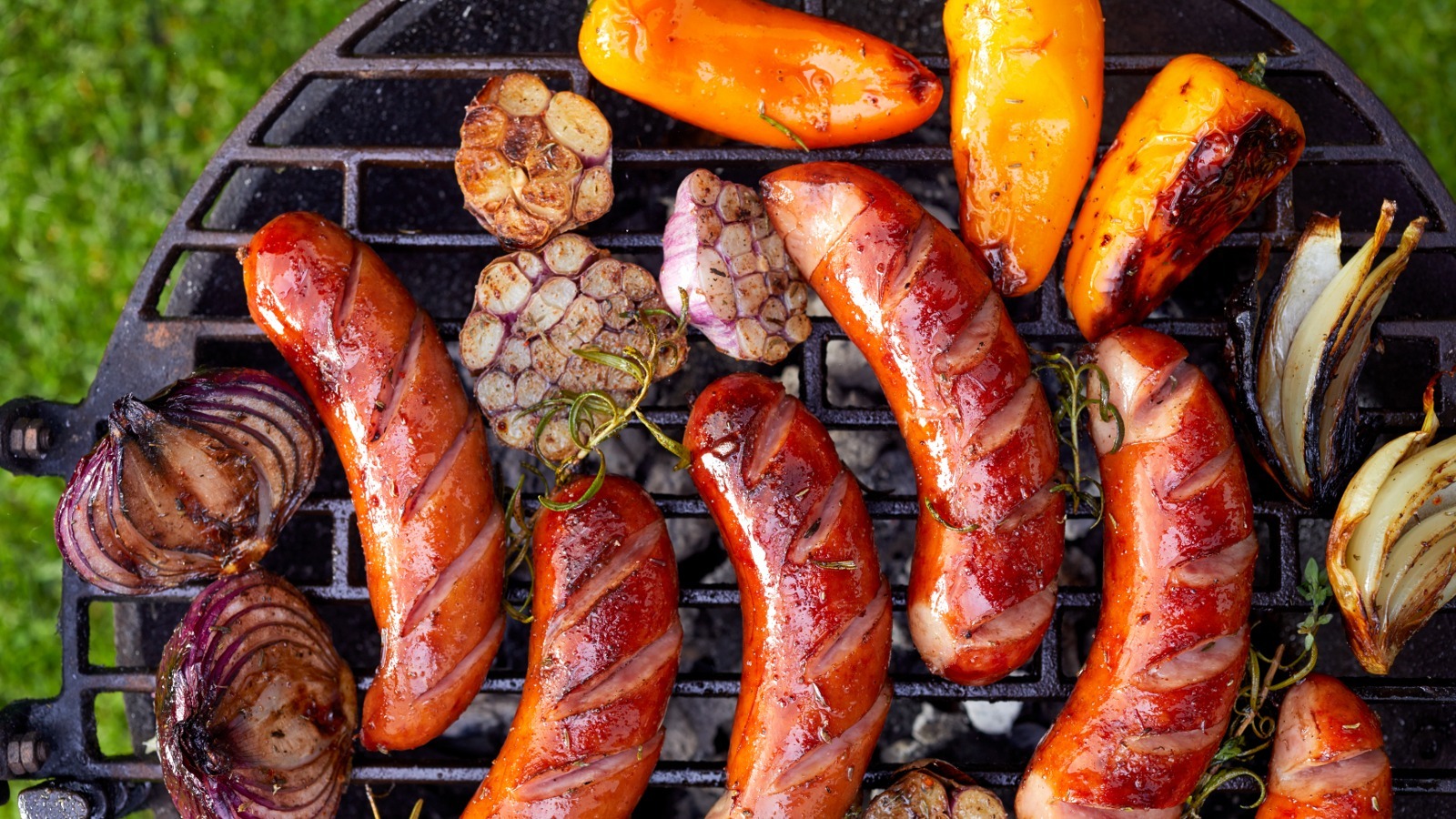 https://www.tastingtable.com/img/gallery/the-flavorful-method-for-grilling-sausages-with-onions-and-peppers/l-intro-1688163393.jpg