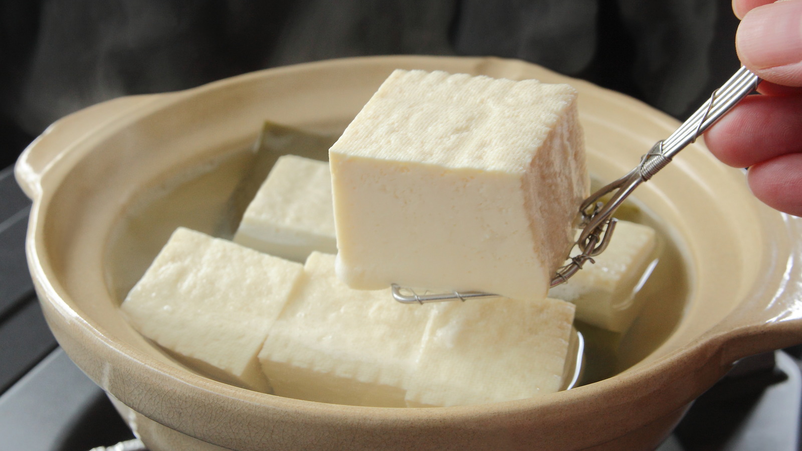 The Flavorful Poaching Technique That Gives Tofu An Incredible Texture