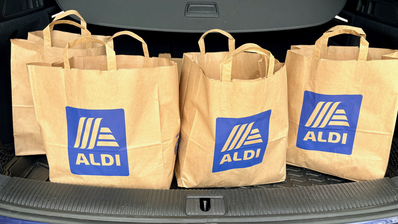 Aldi paper bags in a car
