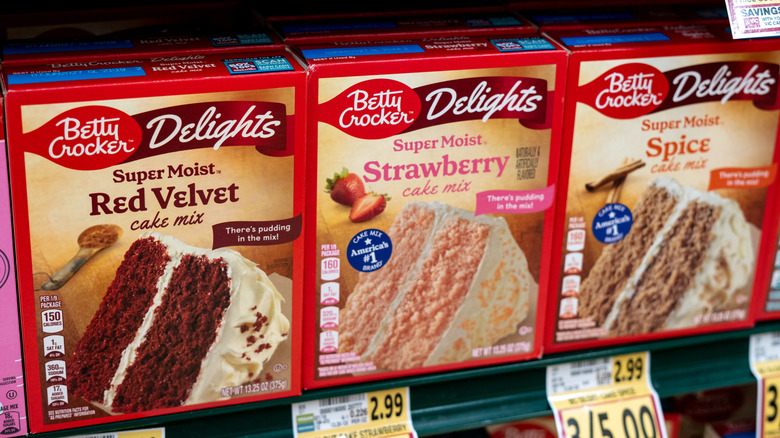 Betty Crocker box cake mixes on a store shelf