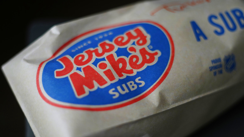 A brown bag containing Jersey Mike's sub