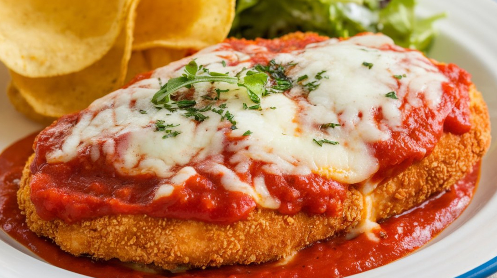 The French Twist That Takes Chicken Parmesan To New Heights - Tasting Table