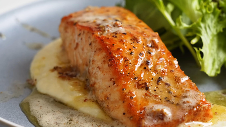 Butter salmon on a plate