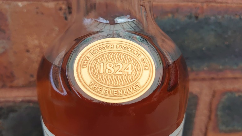 A close up of the bottle neck which pays homage to the The Glenlivet's Gaelic name.