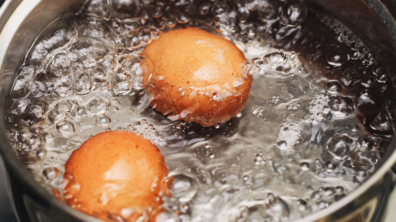 eggs boiling in pot