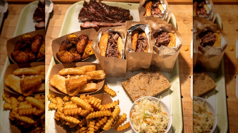 Tray with assorted BBQ, sandwiches, and sides
