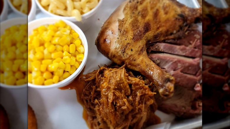 Smoked chicken, brisket, and pulled pork with corn and mac and cheese