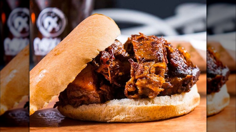 Close-up of a BBQ burnt ends sandwich