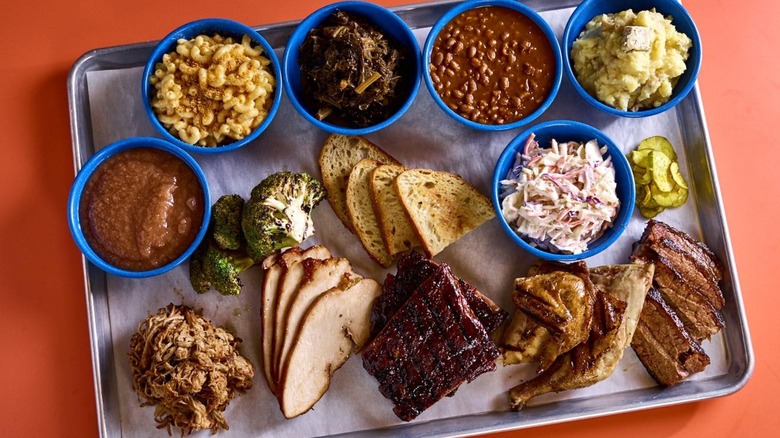 Tray with assorted BBQ meats and sides