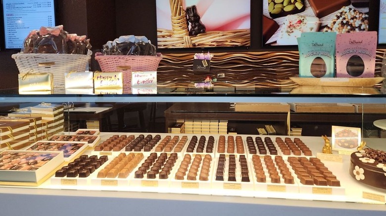 Glass case filled with chocolate confections, Easter specials on top