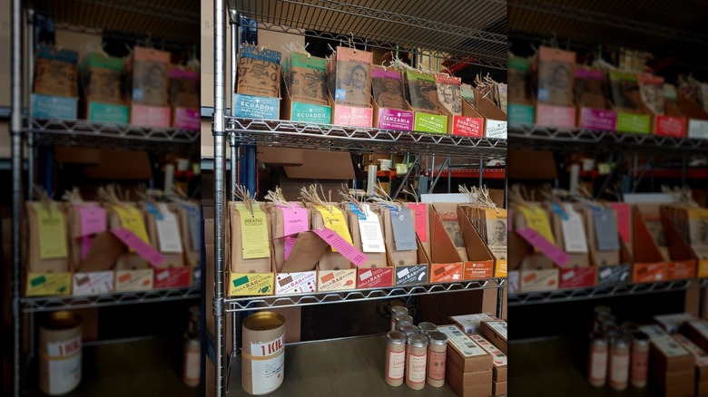 Shelves stocked with various chocolate bars and products