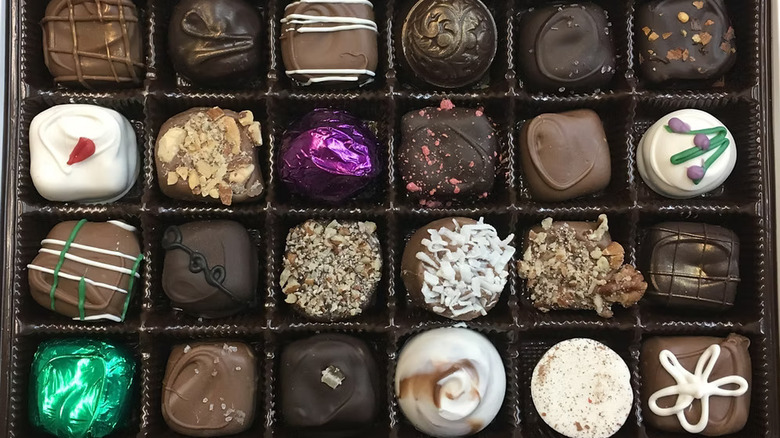 Box containing 24 chocolates of various flavors