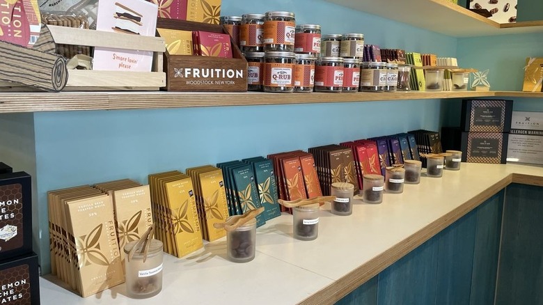 Bars of chocolate, each flavor with sample jar in front of it