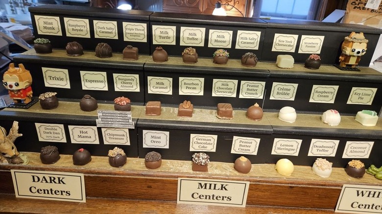 Shelves lined with over two dozen truffle flavors
