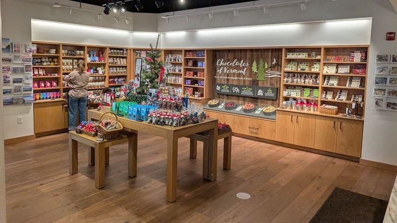Shelves and table fully stocked with chocolate products