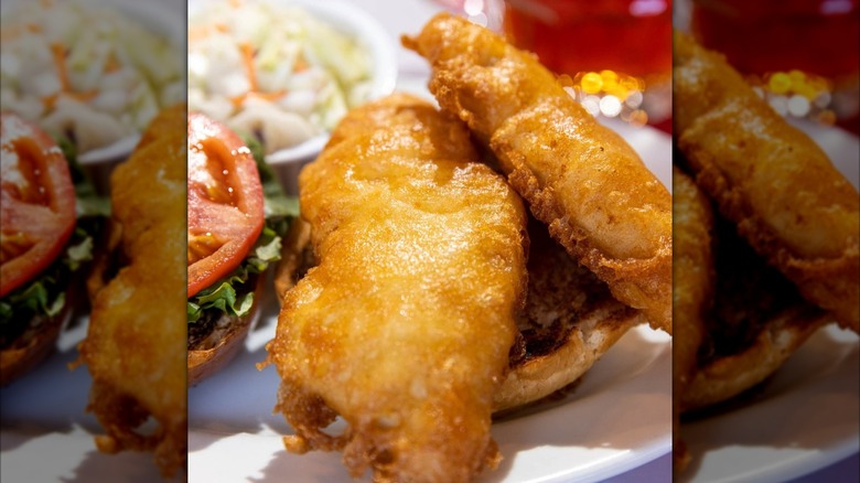 Two pieces of fried fish on a bun at Go Fish!
