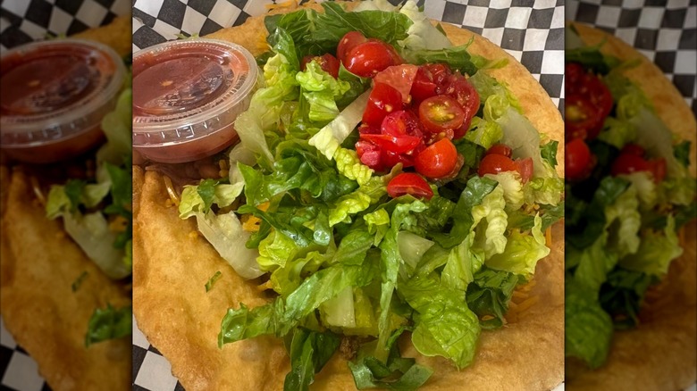 Fry bread with lettuce, tomatoes, and salsa