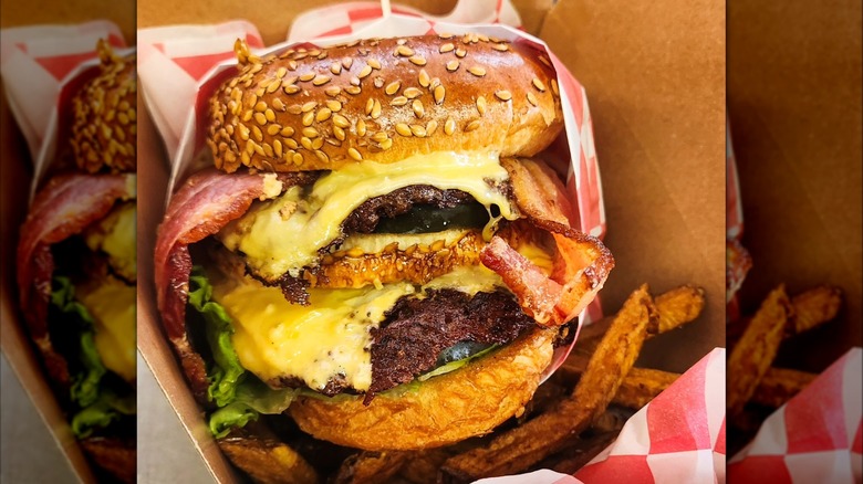 Double cheeseburger with bacon and fries