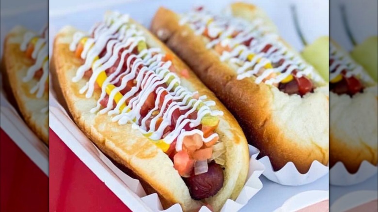 Sonoran hot dogs in paper container
