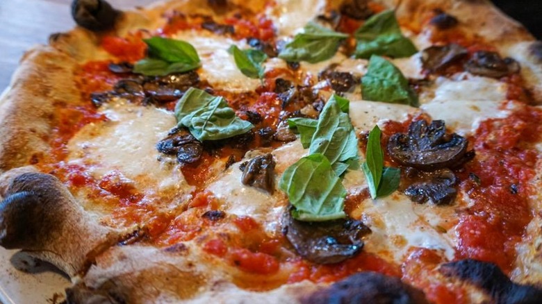 Close-up of wood-fired pizza