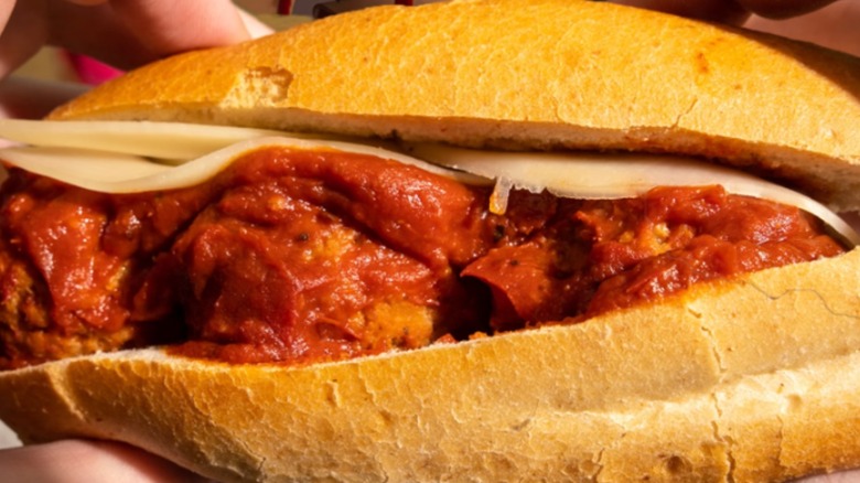 Meatballs and cheese on sub close-up
