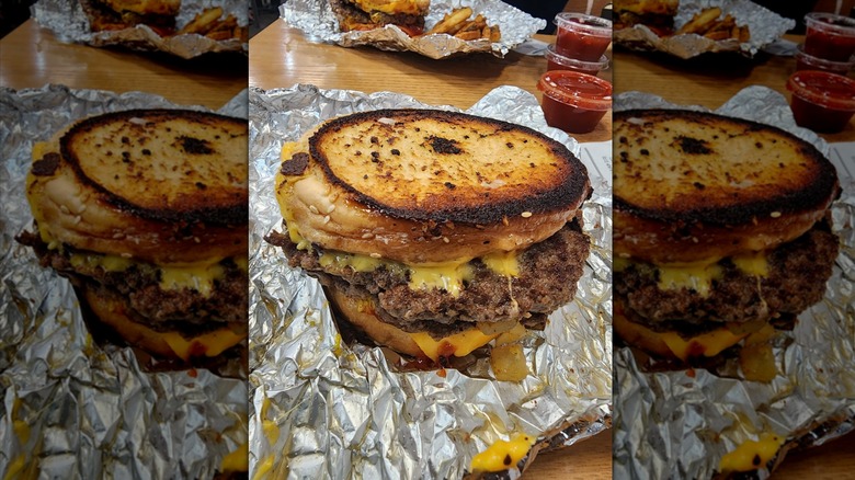Five Guys grilled cheese burger in silver wrapper