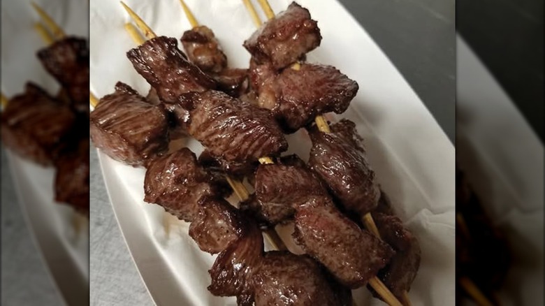 Cubes of meat on skewers