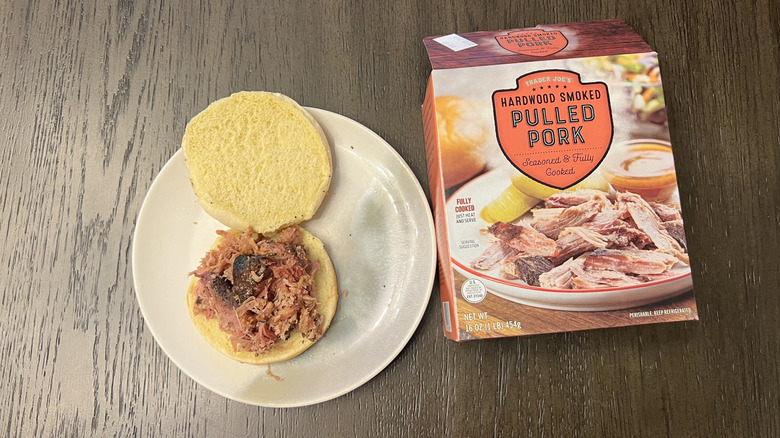 Trader Joe's Hardwood Smoked Pulled Pork on plate beside box