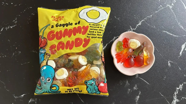 Trader Joe's gummy candy bag next to bowl of candies