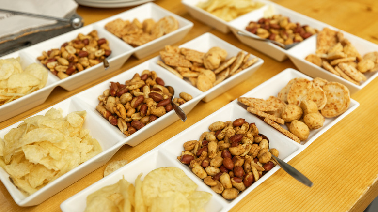 Overhead shot of various snacks in bowls.