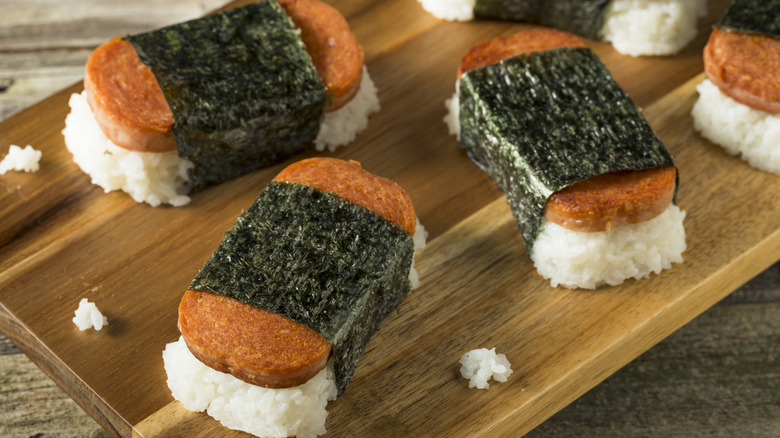 homemade spam musubi on wood board