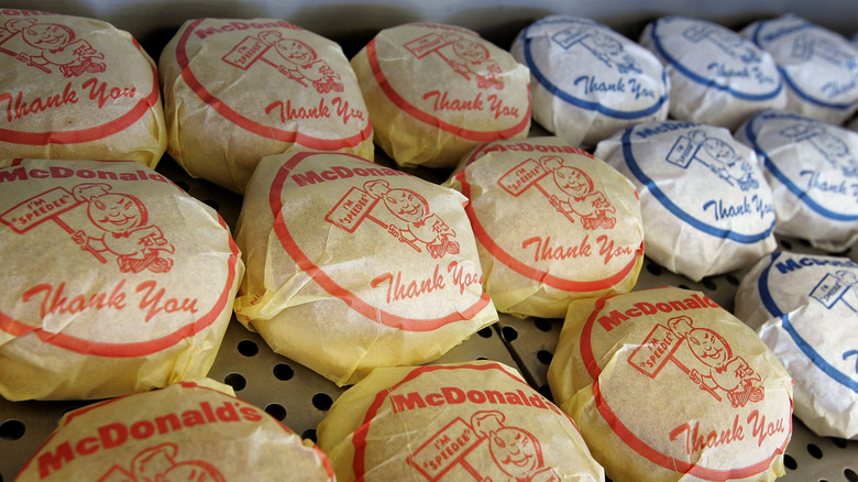A wrapped cheeseburger and hamburger display sits inside the McDonald's USA First Store Museum