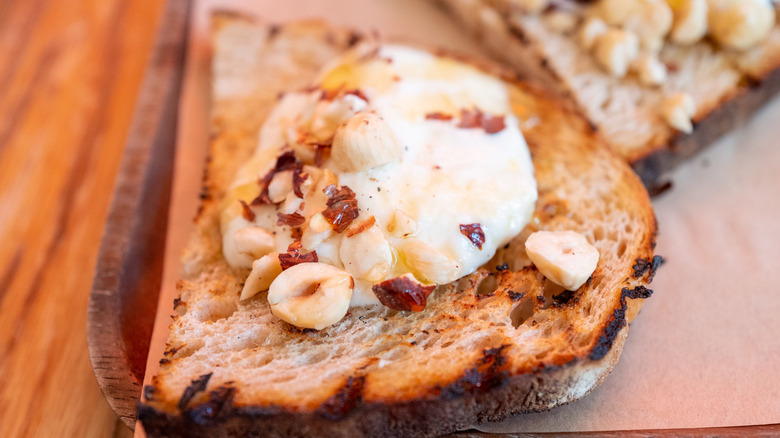 Toasted bread topped with cheese