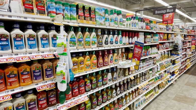 different bottled salad dressings in store