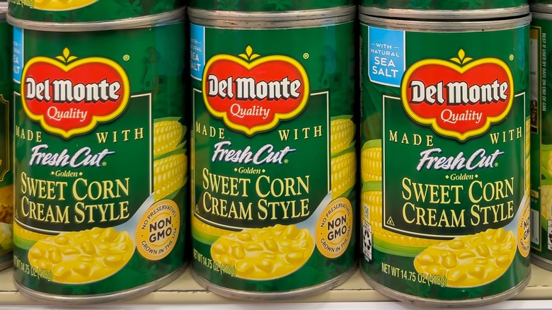 Del Monte cans on shelf